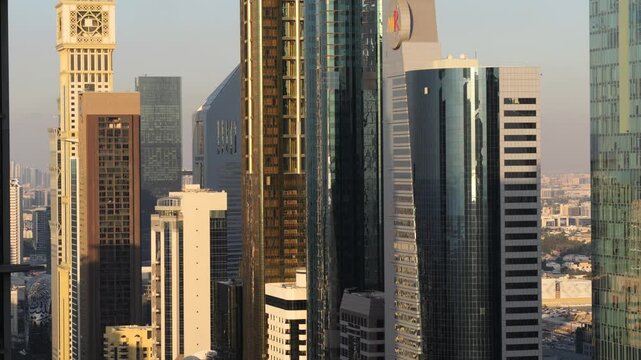 DIFC skyscrapers in Dubai International Financial Centre at sunset, UAE