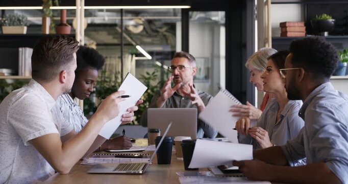 Manager meeting, documents and business people, man or chief editor planning social network article, post or journalist story. Leader, group collaboration and media reporter teamwork on online blog