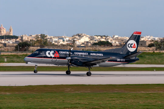 Luqa, Malta - December 30, 2005: Central Connect Airlines - CCA Saab-Fairchild SF-340A(F) (Reg.: OK-CCG) departing runway 32.