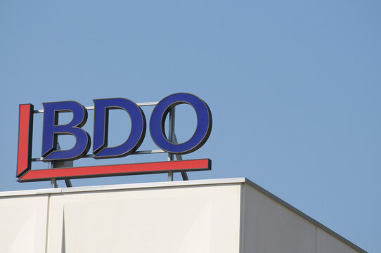 BDO company sign logo at building exterior in Lugano, Switzerland