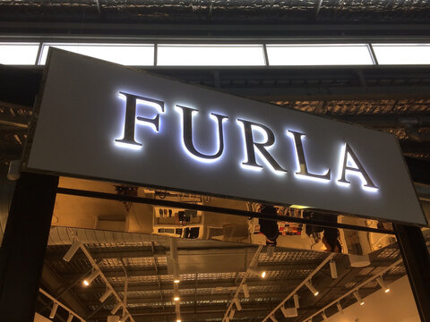Furla brand sign at store entrance in Brisbane, Australia