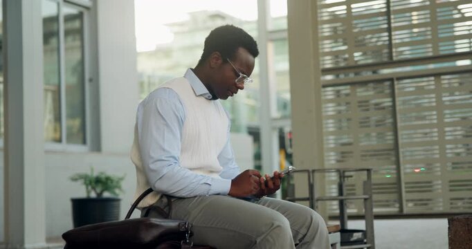 Phone, waiting and black man in city for travel, cab or taxi on mobile app for commuting to work. Technology, bag and African male employee with cellphone for car service at location in urban town.