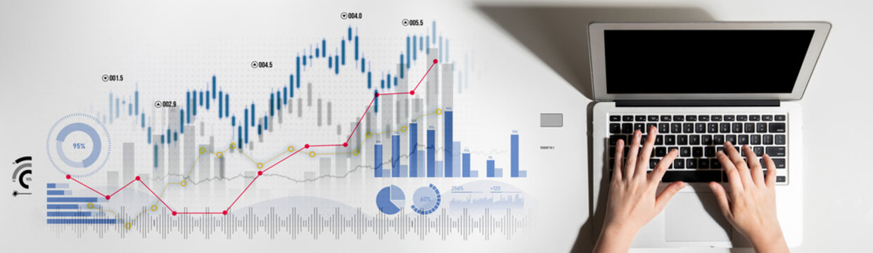 A close-up view of hands typing on a laptop keyboard displaying financial graphs and statistics, ideal for business and finance-related visuals and creative projects. Scalp