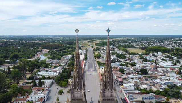 Basilica de lujan spires framing urban landscape
