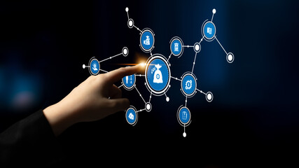 A hand touches a virtual finance interface filled with icons representing investment, data...