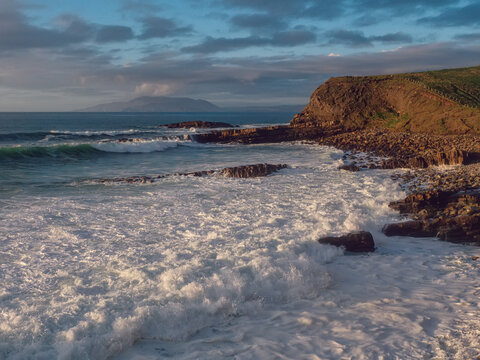 Stunning coast of Mullaghmore Peninsula in county Sligo, Ireland. Amazing nature scenery with powerful ocean and picturesque coast line with rough stone cliff. Popular tourist area.