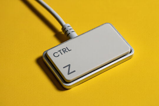 Computer keyboard control key, CTRL Z button for editing and design, isolated on yellow background