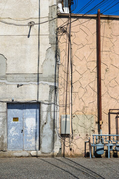 Urban alley with rundown building