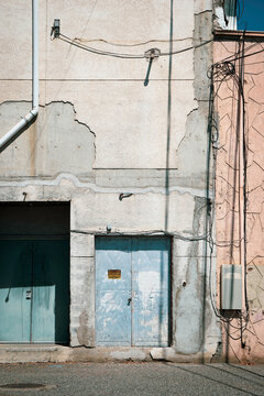 Urban alley with rundown building