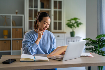 Young woman smiling doing video call work from home