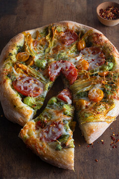 Veggie Pizza with slice cut