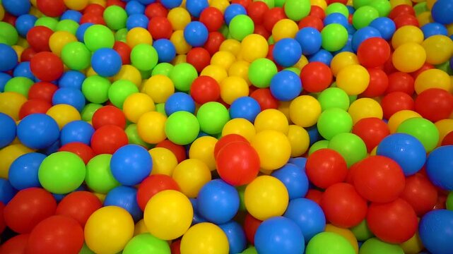Colorful Plastic Balls in Children&rsquo;s Indoor Play Area. Closeup and detail view.