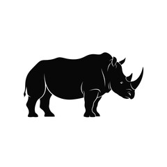 Fototapeta premium A black silhouette of a rhinoceros stands on a white background.