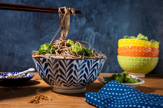 Noodles in bowl with chopsticks