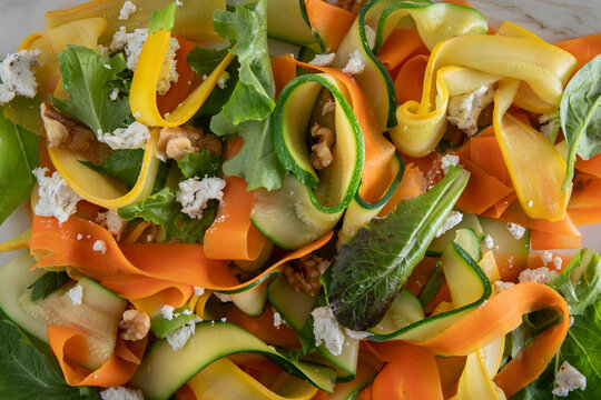 Close-up of shaved carrots, zucchini salad