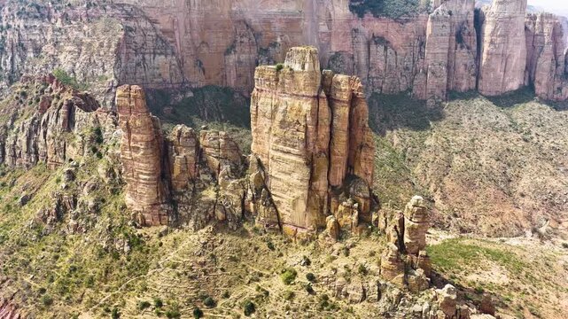 Aerial view of the Abune Yemata rock church and towering sandstone pillars in the Gheralta mountains near Megab, Tigray, Ethiopia.