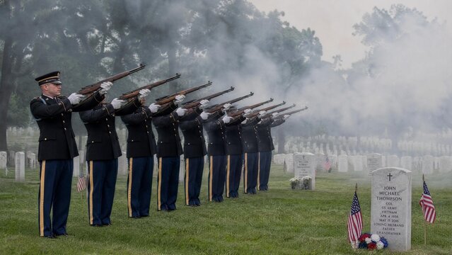 American Military Personnel Performing Three-Volley Salute at National Cemetery during Funeral Service