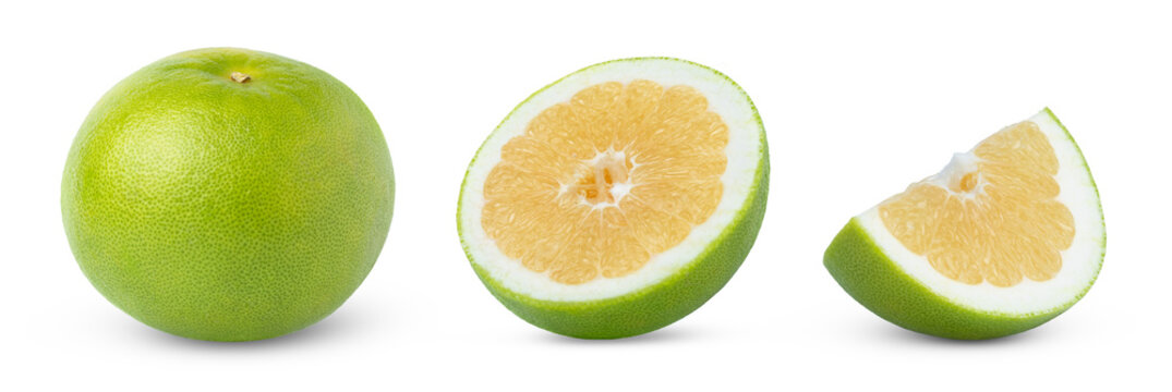 Sweetie grapefruit, pomelit, pomelo or oroblanco citrus fruit with cut in half and a slice isolated. Green fresh sweetie citrus with slices of grapefruit sweetie set, clipping path.