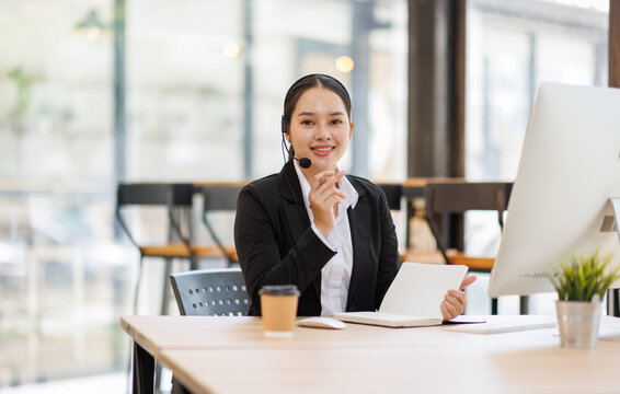 Asian call center agent providing customer support service