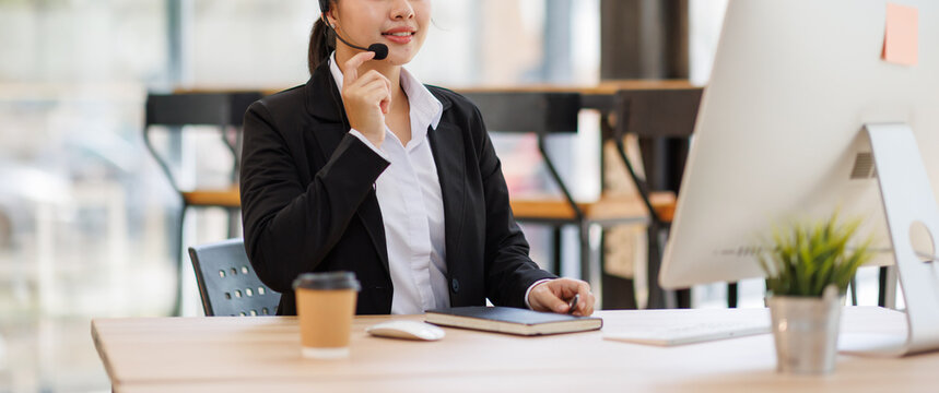 Customer support agent working in a call center office