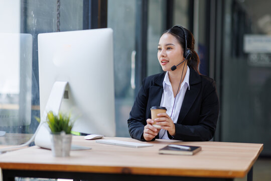 Young woman providing customer support wearing headset