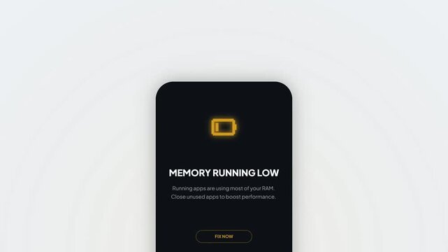 Mobile device displaying a low memory notification with a battery icon and text warning about app performance