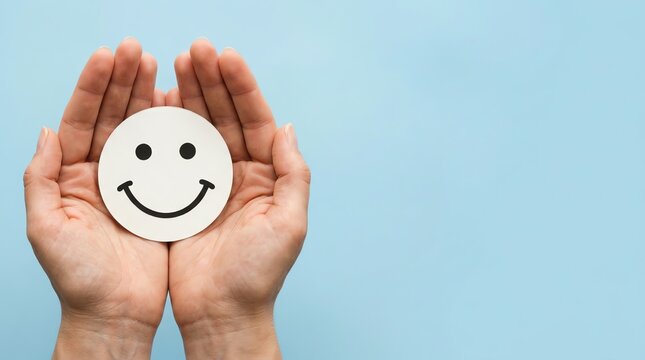 Gentle hands cradling a bright smiley face on a serene blue background, symbolizing happiness, well-being, and positive emotional support