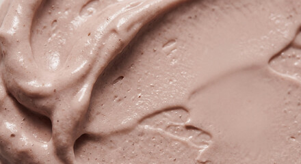 Fototapeta premium Exfoliating pink cosmetic cream texture with natural particles macro background for skincare branding