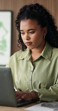 Businesswoman, online and typing with laptop in office, legal assistant and research for case on web. Law firm, paralegal and person with tech for trial preparation, assignment and reading draft