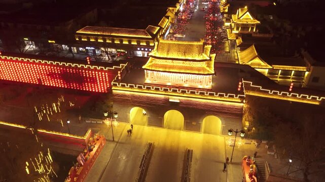 Illuminated Xi'an City Wall Gate at Night