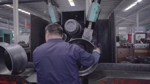 Metal Ring Forming Machine in Industrial Factory Workshop