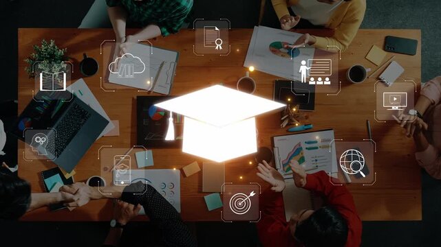 A diverse group of professionals collaborates on an educational project, surrounded by digital icons symbolizing knowledge, learning, and teamwork in a modern workspace. Raster