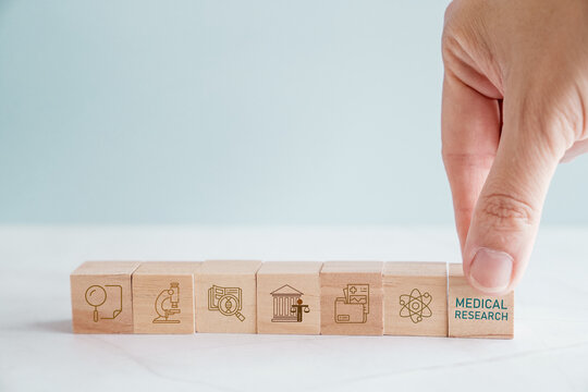 medical research, laboratory analysis, scientific foundations, controlled testing, clinical study, healthcare development, evidence based medicine concept using wooden blocks.