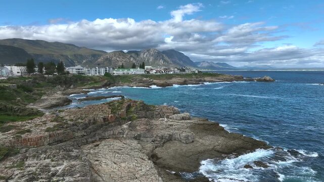 Drone flight over the seaside cliffs in Hermanus, South Africa.