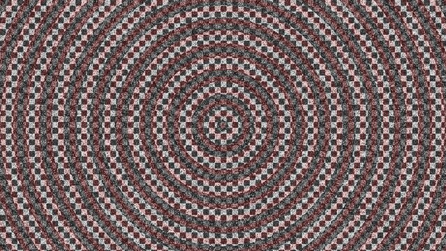 A grey pixelated spiral pattern with a textured background