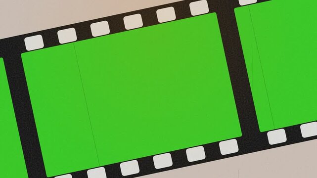 Film Strip Moving Diagonally with Green Screen Frames for Chroma Key Over Retro Vintage Background with Grain and Scratches