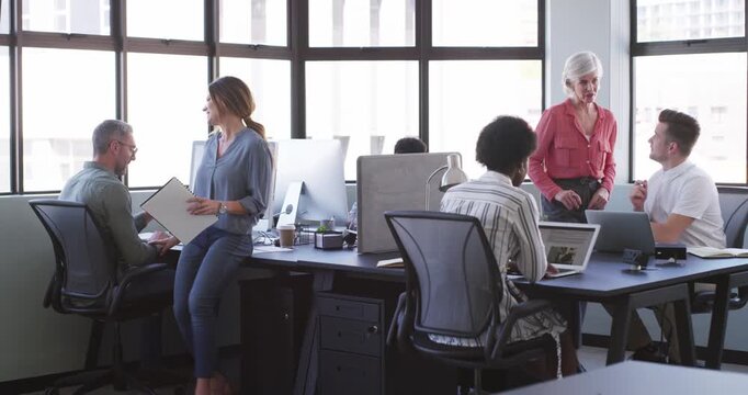 Coworking office, laptop and professional people, woman or employee asking question on project development plan. Communication, manager support and consulting on research, ideas or online solution