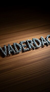 Vaderdag - A Fathers Day Message Crafted from Bicycle Chain on Wood.