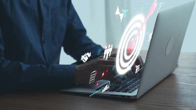 Modern Businessman Using Laptop With Data Visualization And Digital Interface Elements Representing Technology And Innovation In The Workplace. Qubit.
