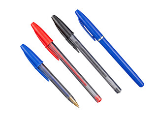 Fototapeta premium Four essential ballpoint pens in blue, red, and black, featuring both clear and opaque barrels, on transparent.