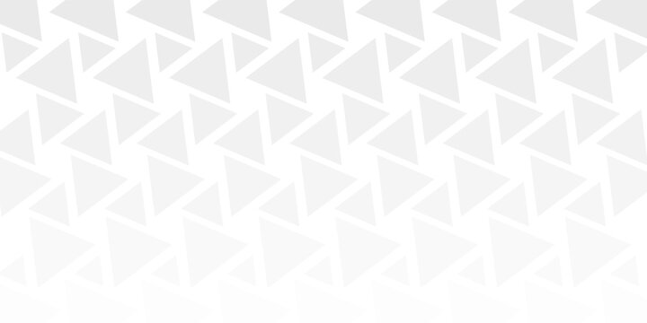 Abstract colorful triangle halftone pattern with rainbow gradient on white background