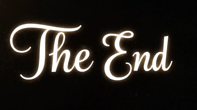 Cinematic The End title card with elegant script on black background