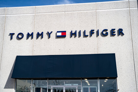 Exterior view of Tommy Hilfiger clothing store storefront. Mississauga, Canada - May 4, 2026.