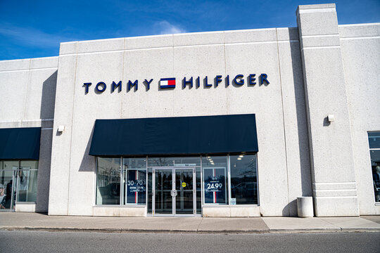 Exterior view of Tommy Hilfiger clothing store storefront. Mississauga, Canada - May 4, 2026.
