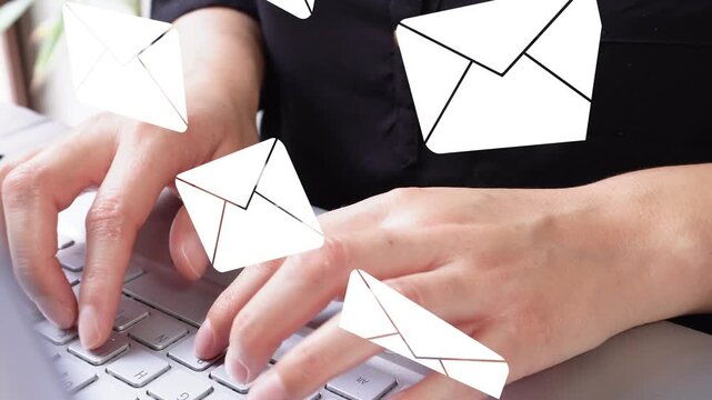 Detail of female hands typing on a laptop with an animation of several mail envelopes rising. Arrival of several emails.