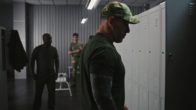 Three Diverse Military Officers Prepare For Training in Base Locker Room, Sharing Light Conversation and Humor. Concept Unity, Trust, and Strong Camaraderie Within Team, Human Side of Military Life.