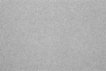 Fototapeta premium Greyscale fabric texture with soft woven surface and subtle monochrome textile details. Ideal for backgrounds, upholstery visuals, and modern minimalist design.