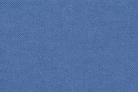 Classic denim fabric texture with visible twill weave and rugged natural look. Ideal for backgrounds, fashion design, and textile applications.