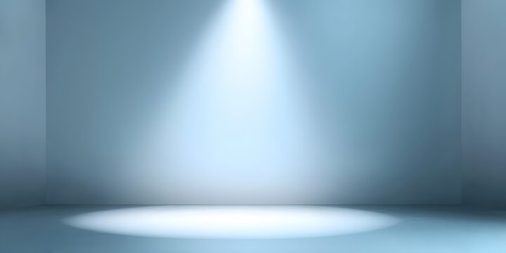 A minimalistic blue stage with a spotlight shining down. Ideal for presentations, performances, or visual storytelling focusing on light and space.