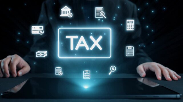 A businessman interacts with a tablet while tax icons appear in a digital format above. This image represents finance, technology, and modern tax management strategies. Qubit